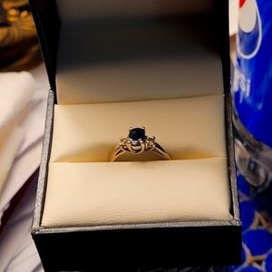 Gold diamonds and purple emerald ring